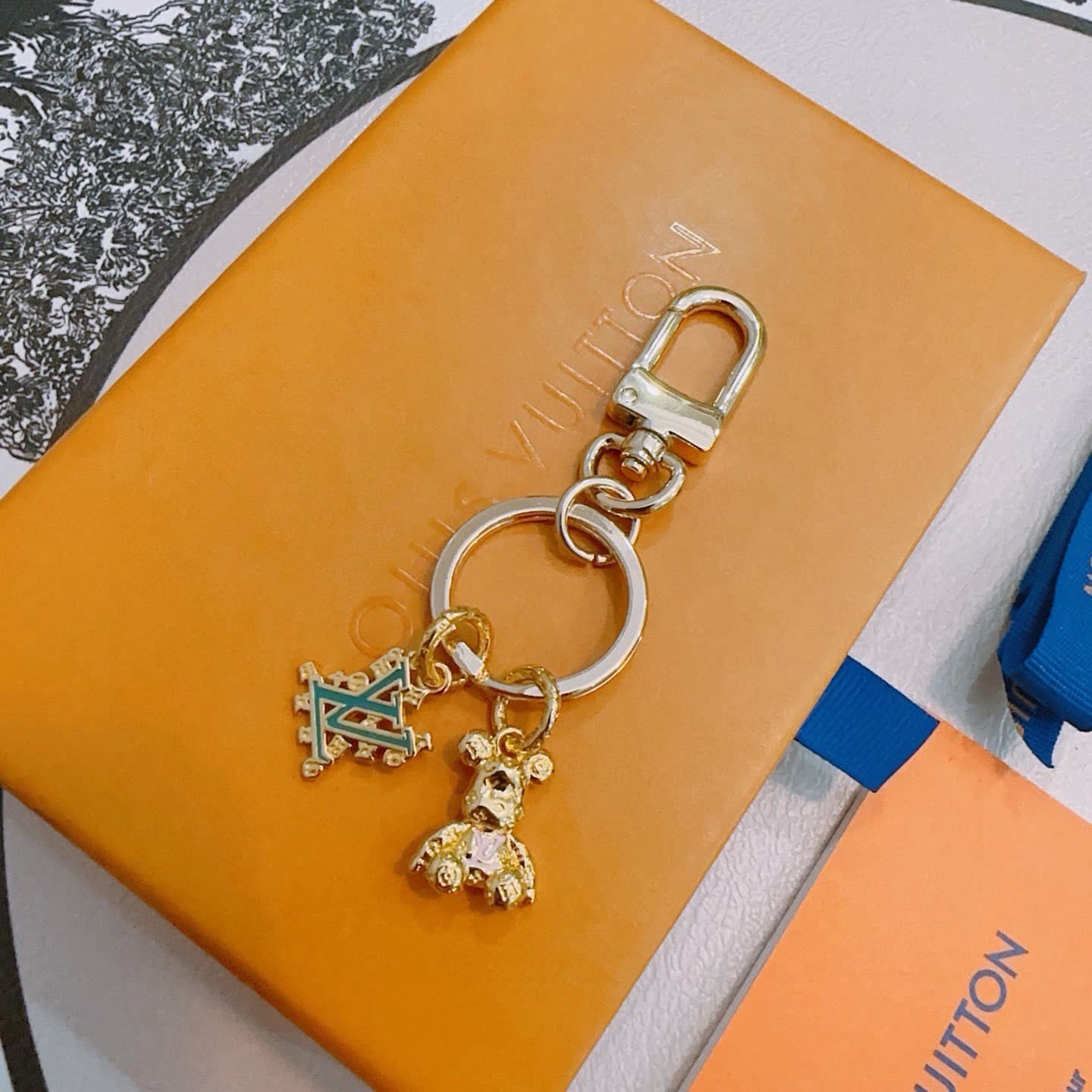 Louis Vuitton Keychain with Monogram and Bear Charm